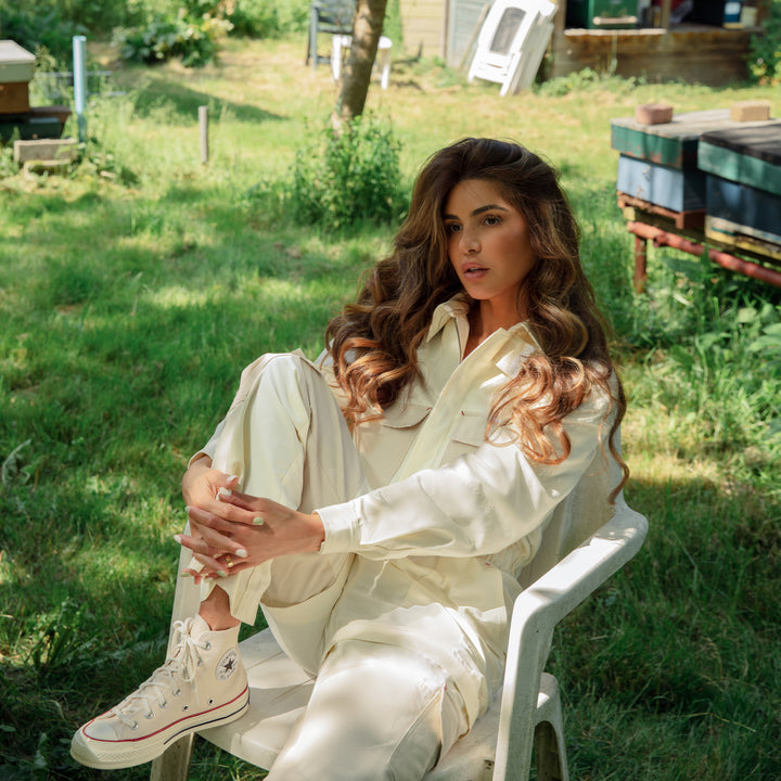 Negin Mirsalehi in the Gisou Garden Jumpsuit