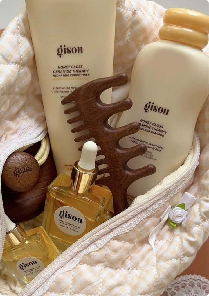 Gisou hair products in toiletry bag.