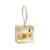 Gisou Instant Hair Therapy Duo holiday gift box with a ribbon loop, showing the mini hair mask and hair oil inside.