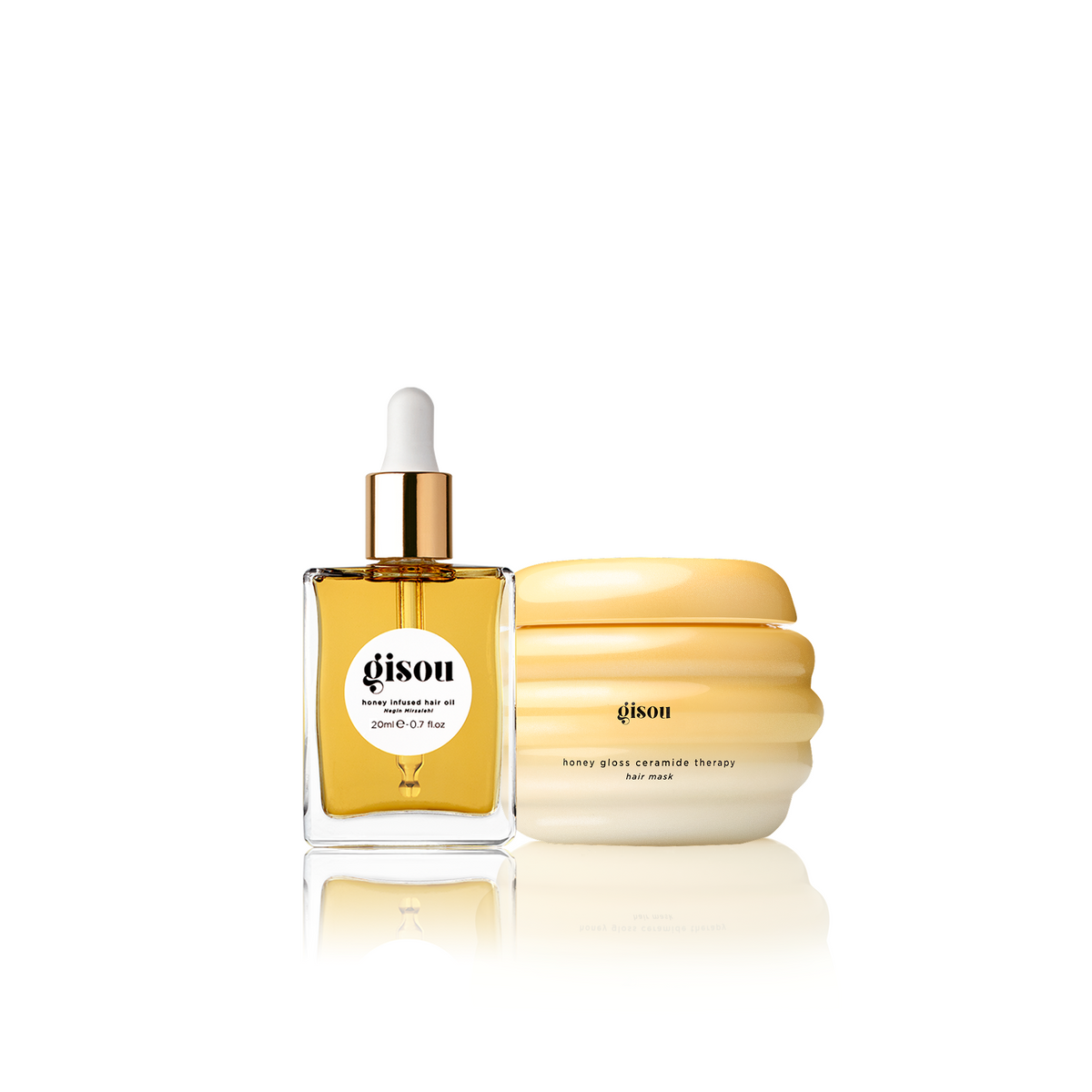 Gisou Deep Treatment Duo Mini: Honey Infused Hair Oil and Honey Gloss Hair Mask minis on a white background.
