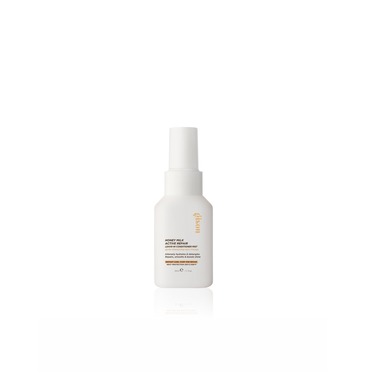 Gisou milk leave-in conditioner mist 50ml on white background.
