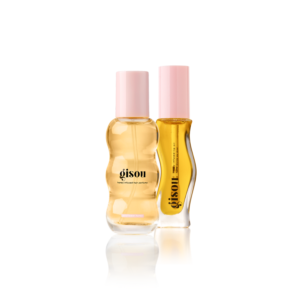 Gisou Refresh Your Glow Duo: Honey Infused Hair Perfume and Lip Oil on a white background.