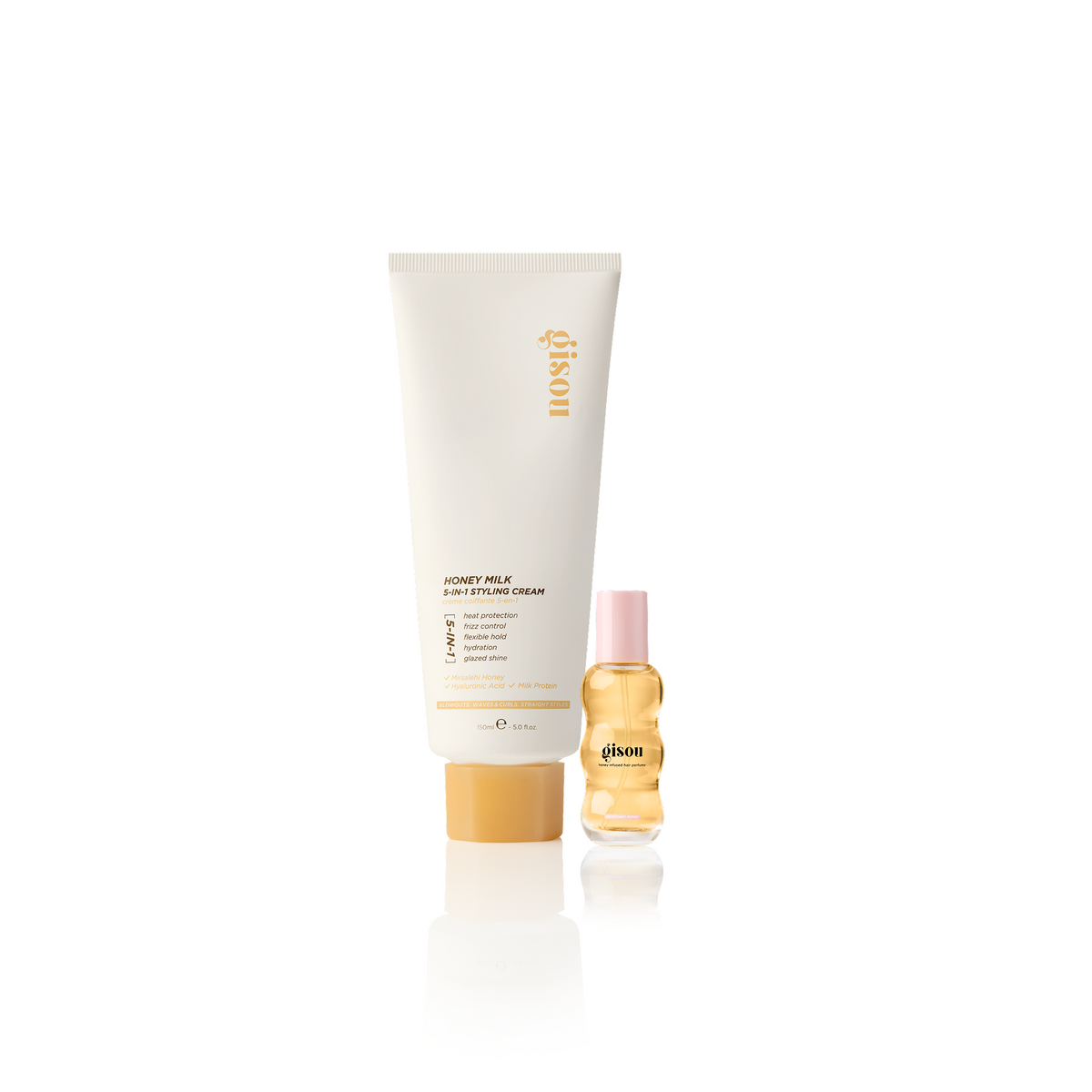 Gisou Style & Spritz Duo in Wildflower Honey: Honey Milk 5-in-1 Styling Cream and mini Hair Perfume on a white background.