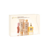 Gisou Shower to Shine Kit holiday gift box, showing the mini shampoo, conditioner, hair oil, and lip oil inside.