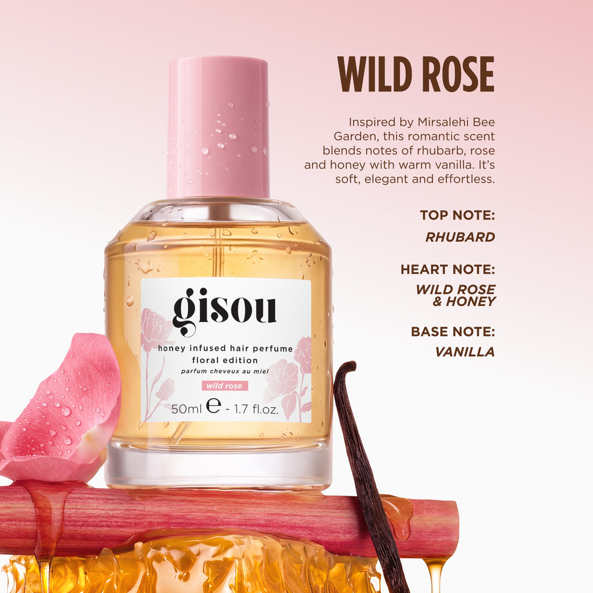 Gisou Honey Infused Hair Perfume Wild Rose bottle with a rose petal and vanilla pod, describing notes of rhubarb, wild rose, honey, and vanilla.