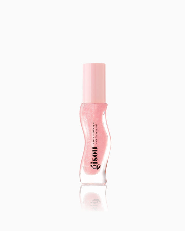 Light pink shimmer lip oil.