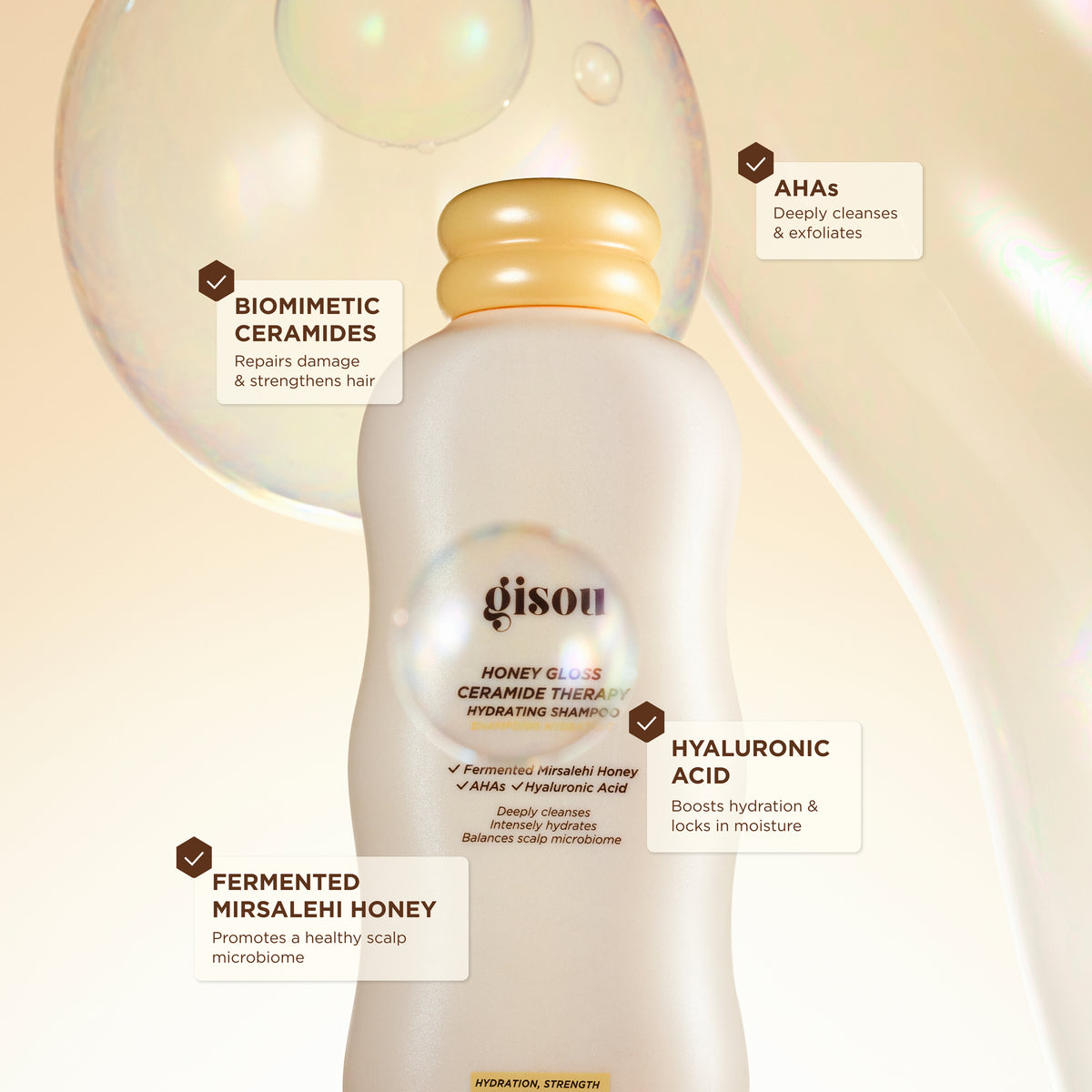 Gisou Honey Gloss Ceramide Therapy Hydrating Shampoo with AHAs, hyaluronic acid, ceramides, and Mirsalehi honey benefits.
