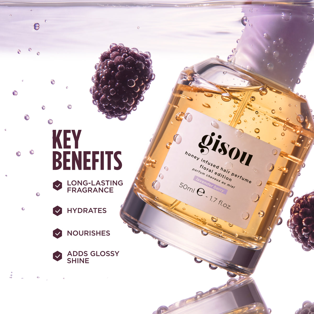 Gisou Honey Infused Hair Perfume Floral Edition bottle with blackberries, listing key benefits: long-lasting fragrance, hydrates, nourishes, and adds glossy shine