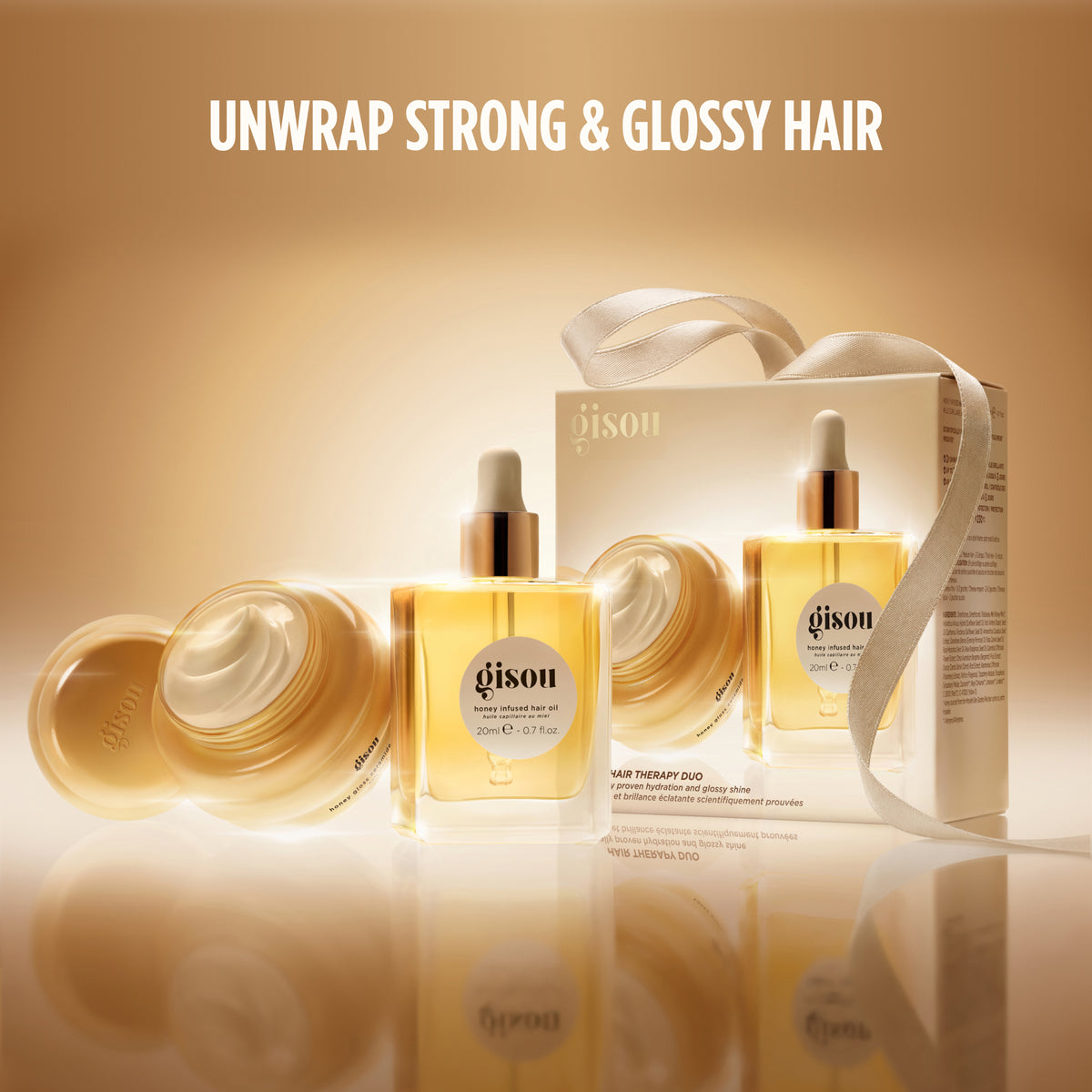 Gisou Instant Hair Therapy Duo box with ribbon, hair mask, and hair oil.