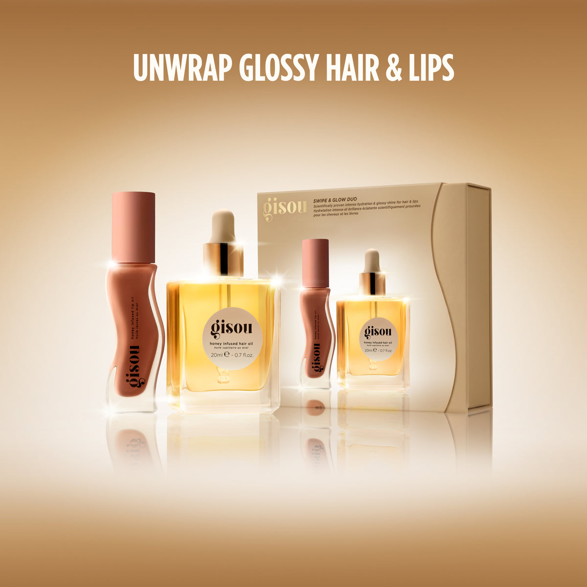 Gisou Swipe & Glow Duo box, lip oil, and hair oil.