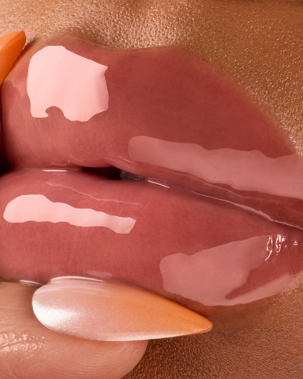 Close up of glossy lips.
