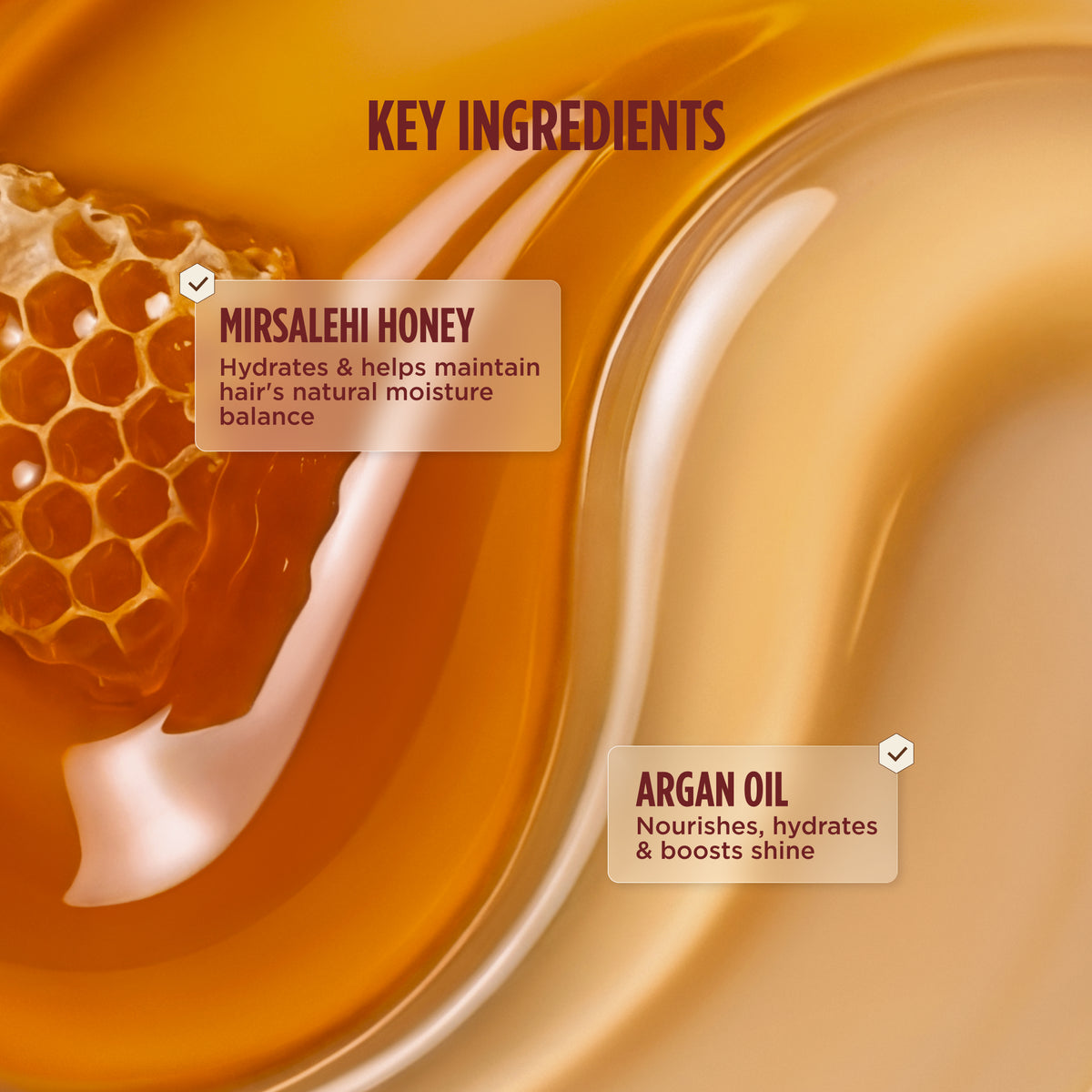 Close-up swirl of honey and argan oil, listing Gisou's key ingredients: Mirsalehi Honey and Argan Oil.
