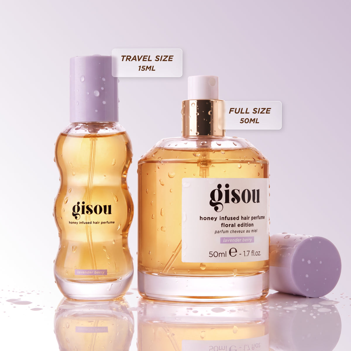 Gisou Honey Infused Hair Perfume Floral Edition in travel size (15ml) and full size (50ml) bottles side by side.