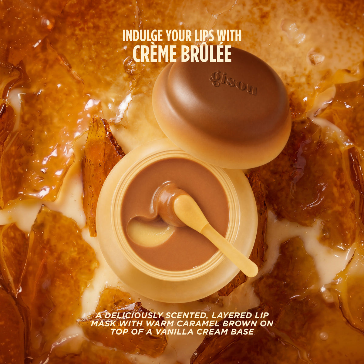 Gisou Crème Brûlée Lip Mask jar on caramelised sugar