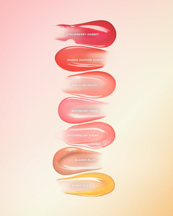 Seven different lip oil swatches from darkest to lightest.
