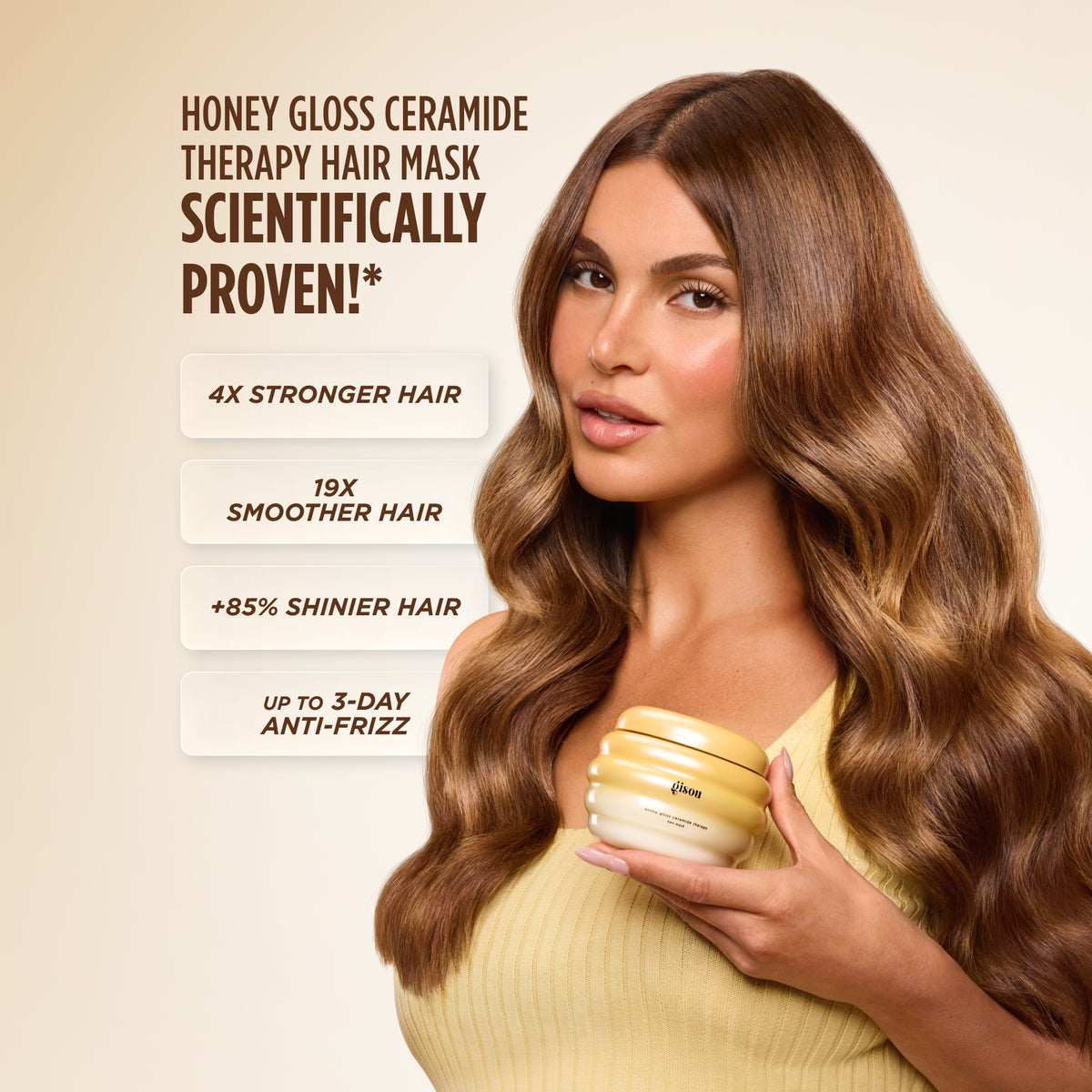 Model with long wavy brunette hair holding the hair mask, listing results: 4x stronger, 19x smoother, 85% shinier hair, and up to 3-day anti-frizz.