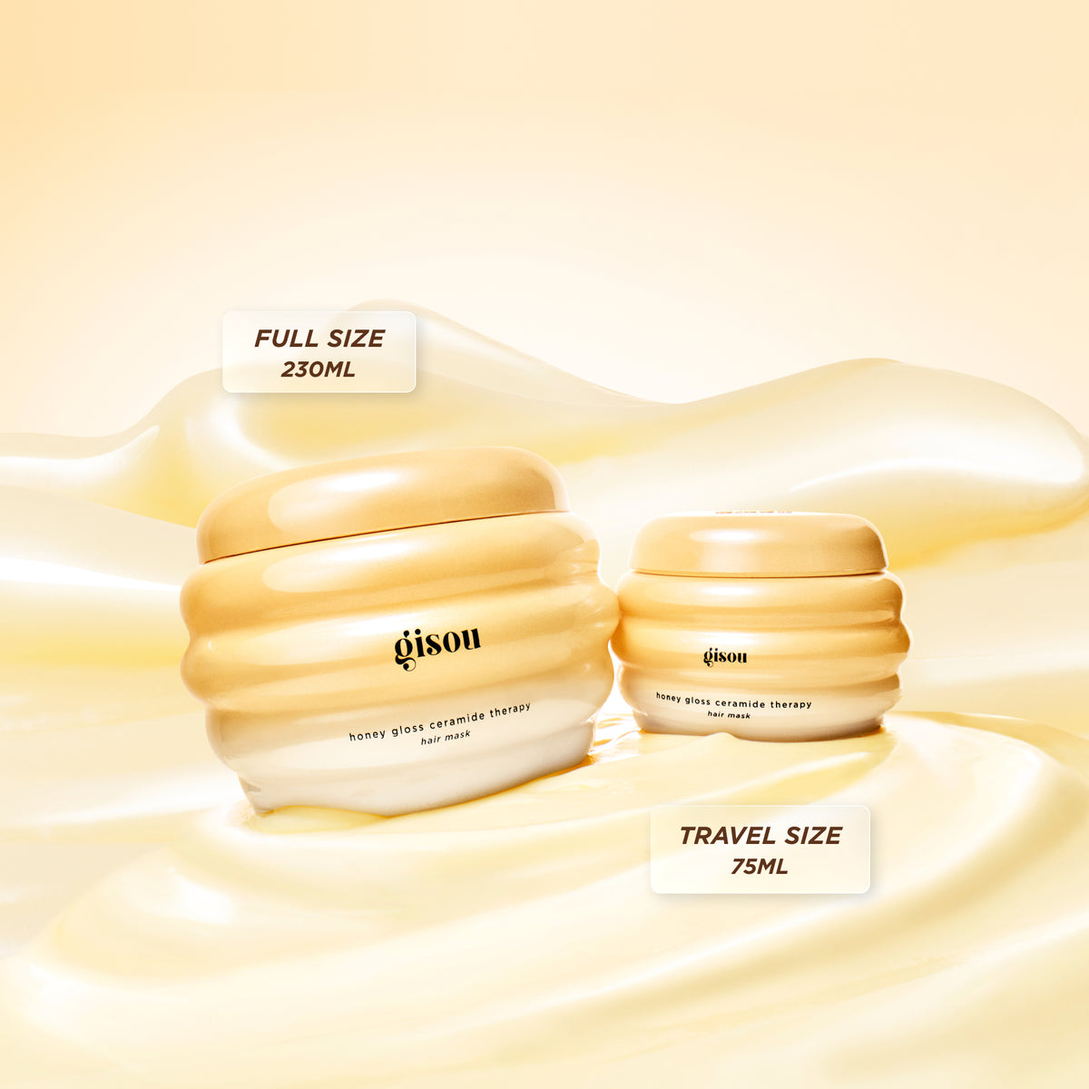 Gisou Honey Gloss Ceramide Therapy Hair Mask in full-size and travel-size next to each other on yellow textured background.
