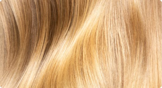 Close-up of glossy blonde waves