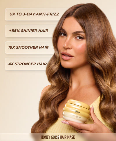 Model with long wavy brunette hair holding the hair mask, listing results: 4x stronger, 19x smoother, 85% shinier hair, and up to 3-day anti-frizz.