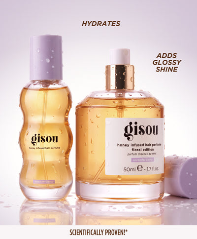 Gisou Honey Infused Hair Perfume Floral Edition and a mist bottle side by side, listing benefits: hydrates and adds glossy shine.