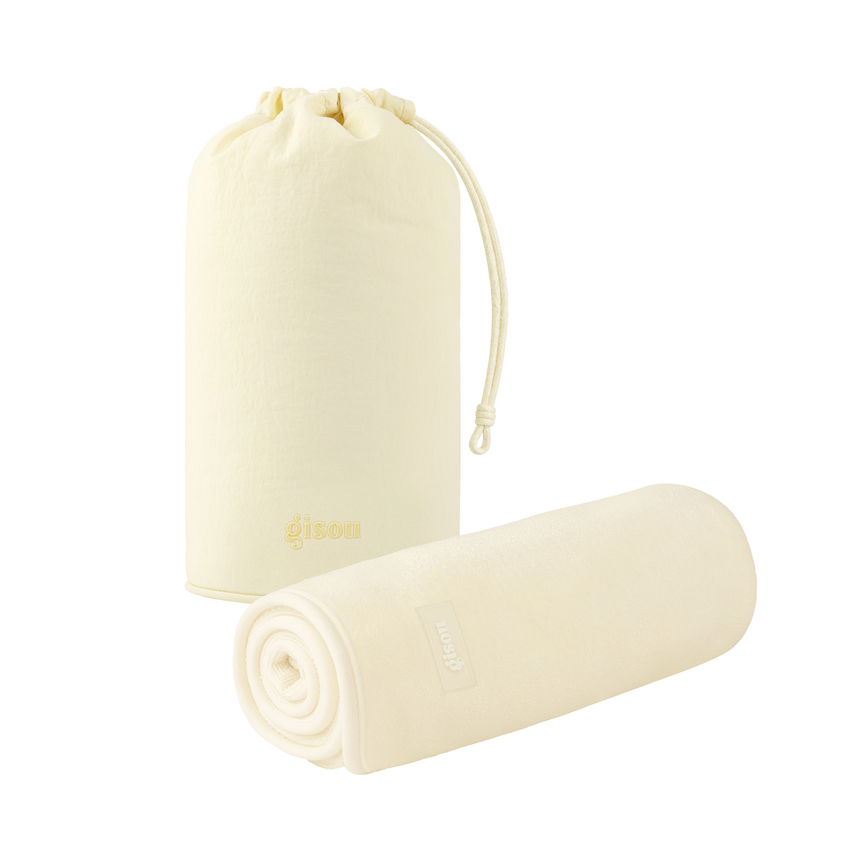 Gisou Honey Glow Hair Towel and a pouch on white