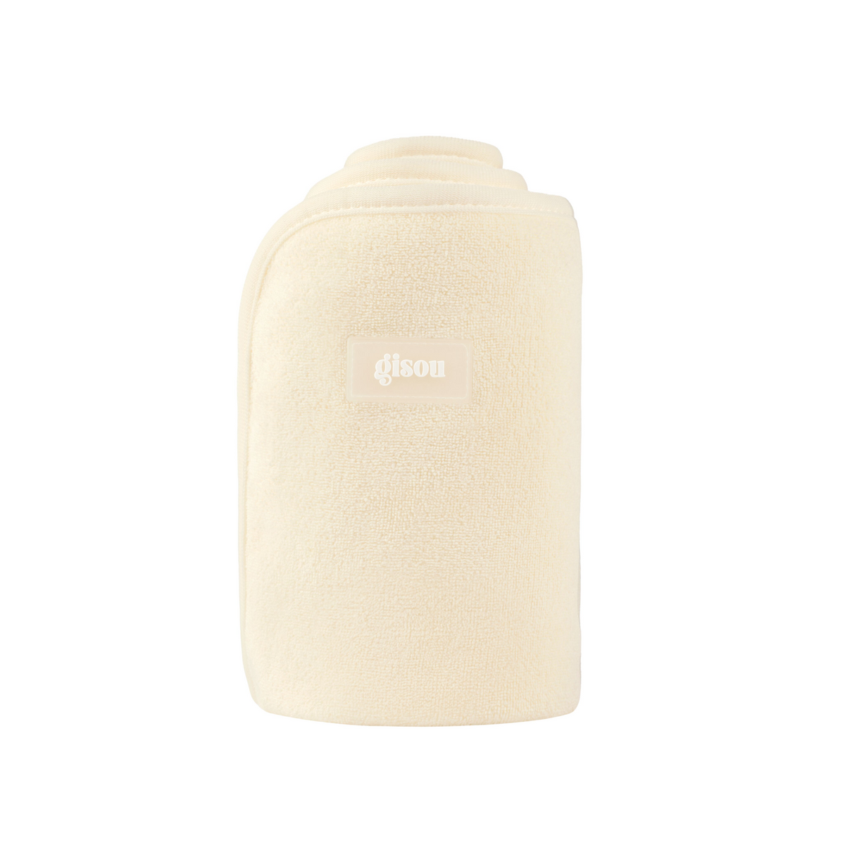 A folded Gisou Honey Glow Hair Towel on white.