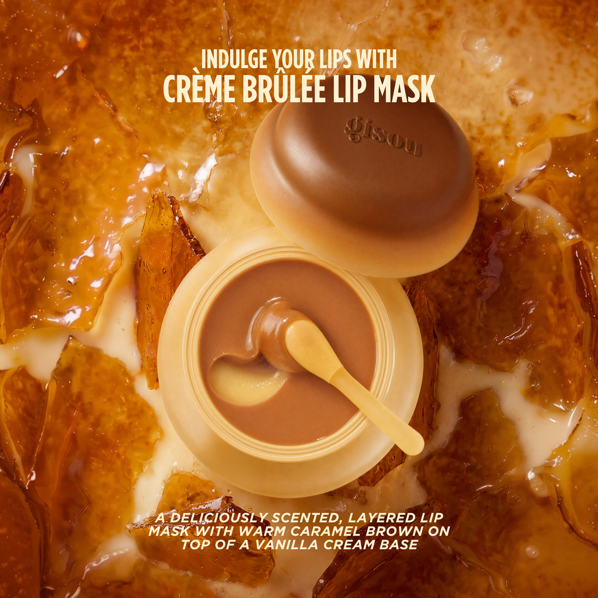 Gisou Crème Brûlée Lip Mask jar on caramelised sugar