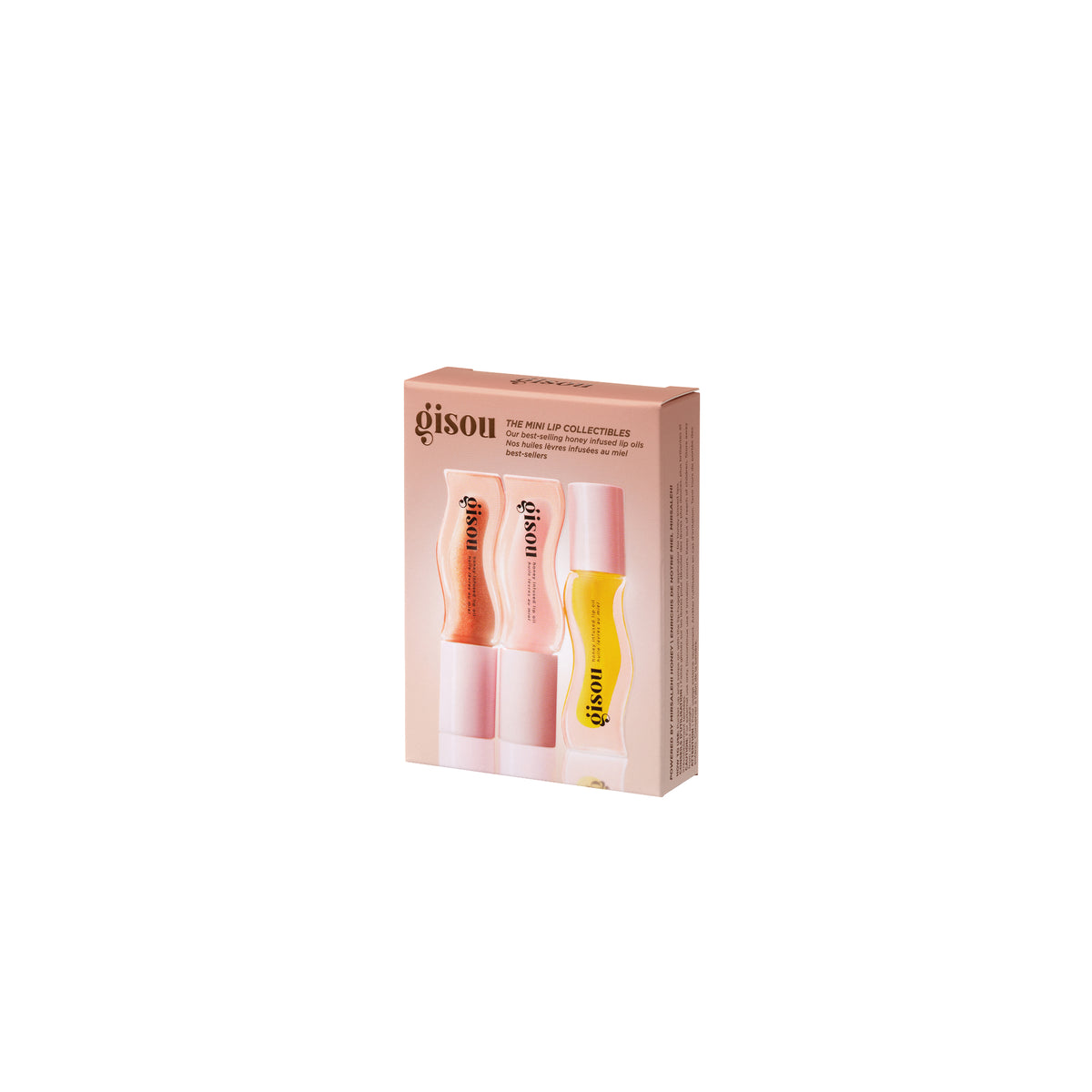 Pastel pink product box featuring three lip oils in warm tones: peach-pink, soft pink, and golden yellow, representing a mini trio set.