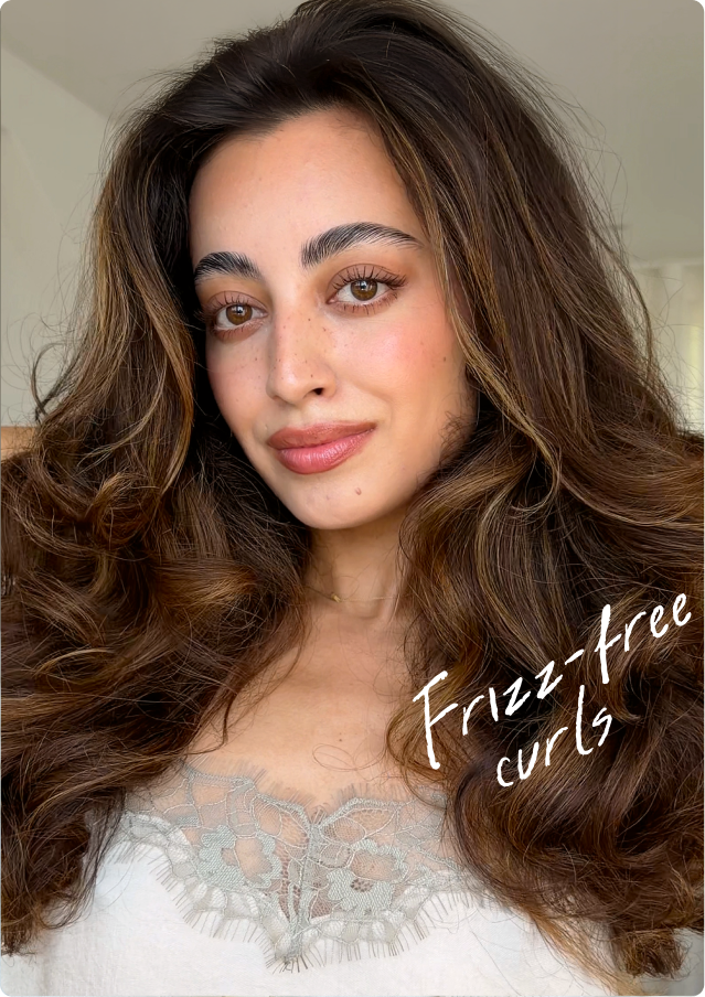A model with long wavy brunette hair labeled 