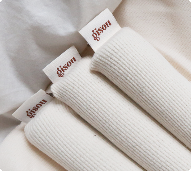 A close-up of Gisou hair-styling rods.