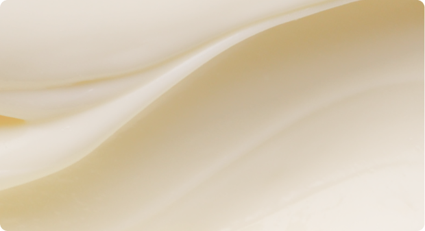 Close-up texture of Gisou Honey Gloss Hair Mask.