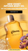 Bottle of the Honey Infused Body Oil with flowers and honey comb