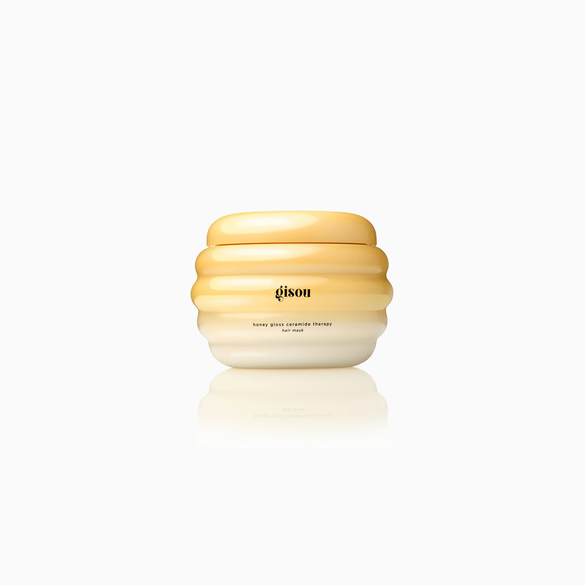 Gisou honey gloss ceramide therapy hair mask 75ml on a clean background.