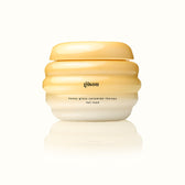 Hair mask in a yellow honeycomb hive jar.
