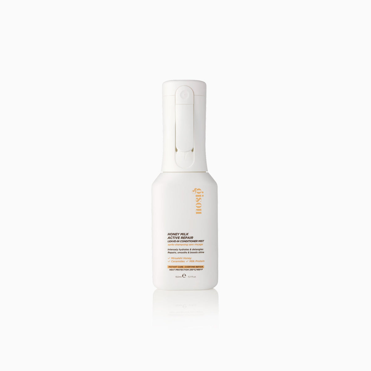 Gisou Honey Milk Active Repair Leave-In Conditioner Mist on white background, lightweight spray bottle with nourishing, hydrating formula for smooth, glossy hair.