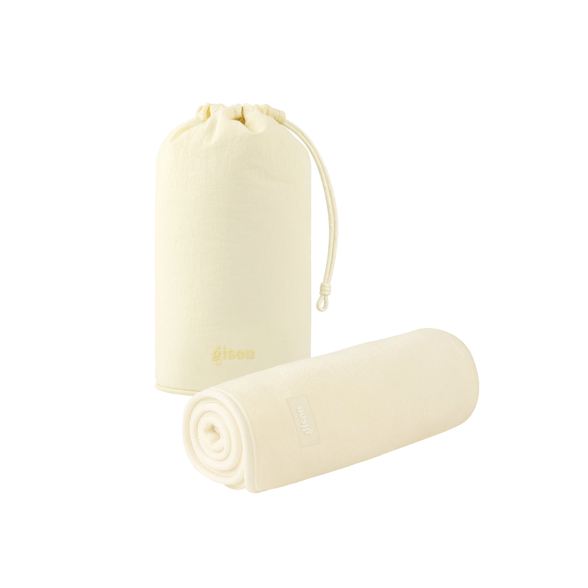 Two Gisou Honey Gloss Microfiber Hair Towels, one folded upright in a pouch and one rolled, on white.