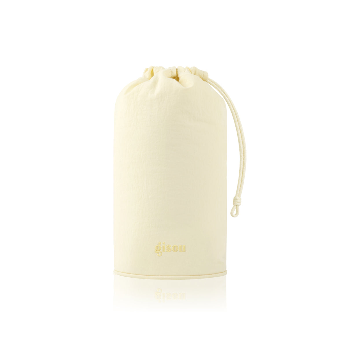 Gisou Honey Gloss Microfiber Hair Towel folded and standing upright in a pouch on white.